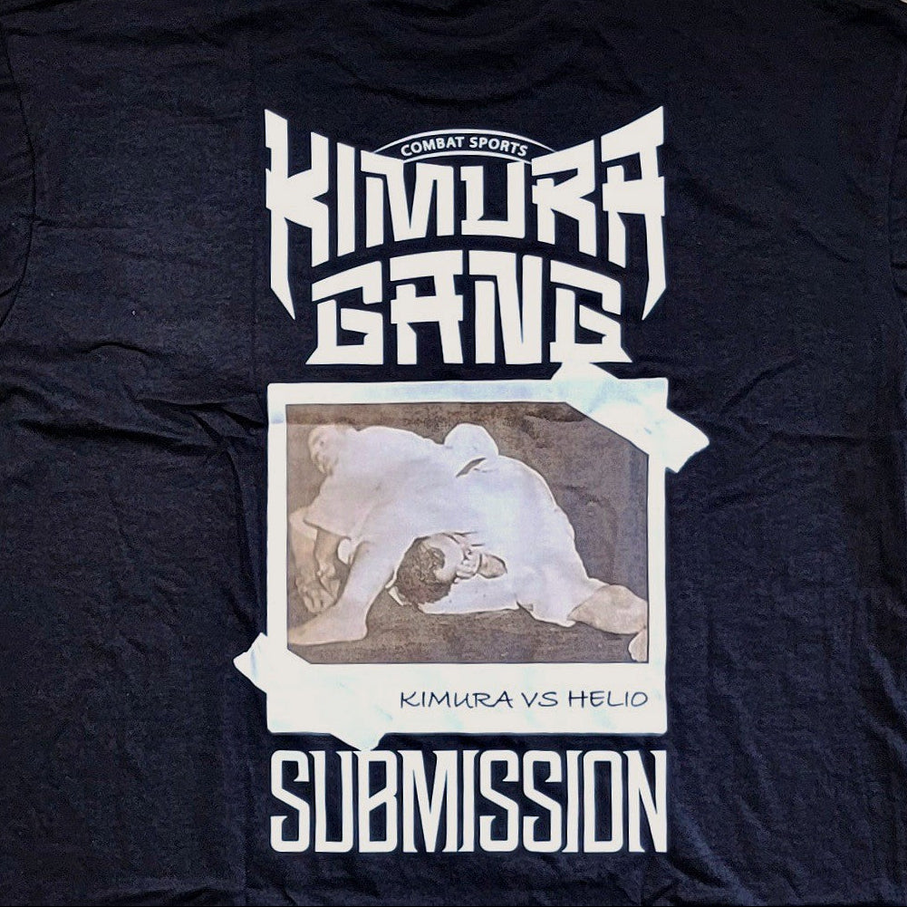 Black t-shirt with 'Kimura Gang' and 'Submission' graphic on a textured surface