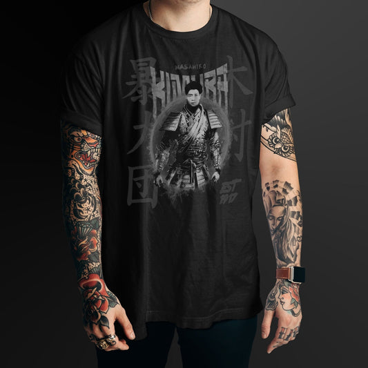 Person wearing a black t-shirt with a gray graphic design